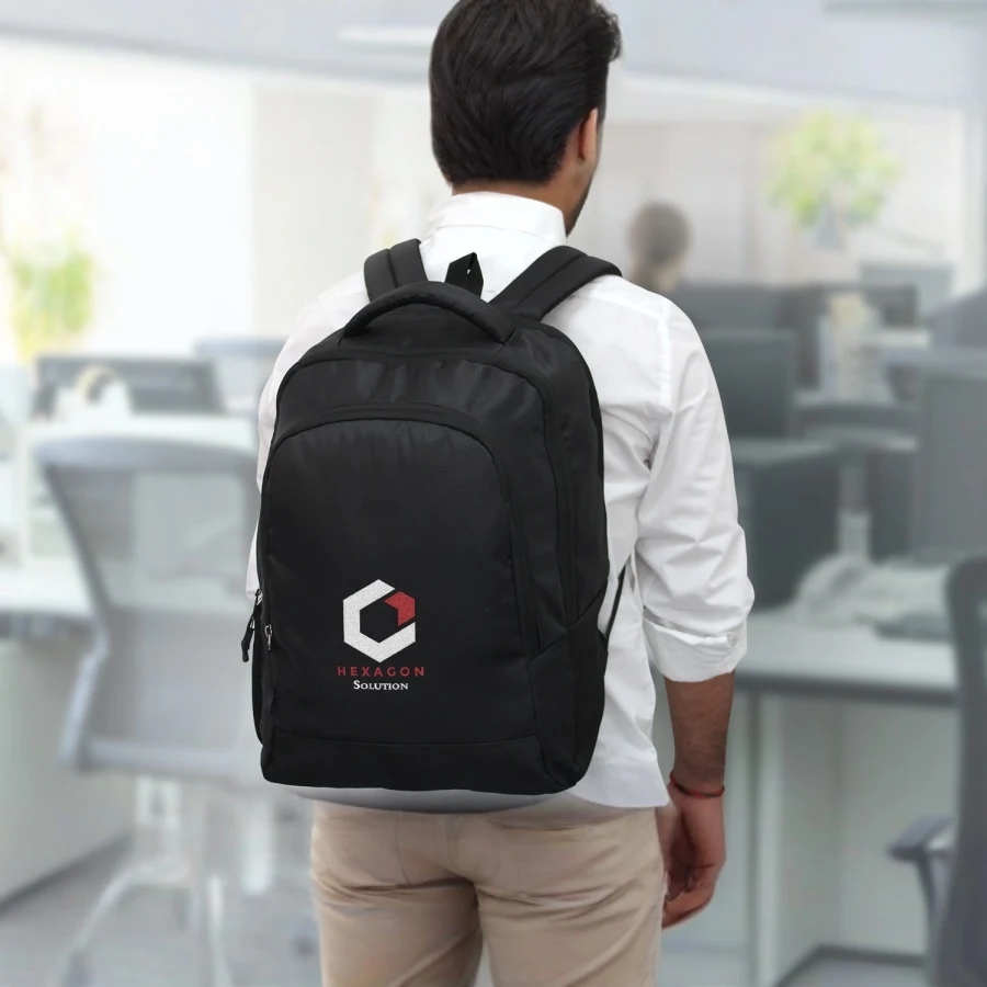 Customized corporate gifting bags with company logo including laptop bags, conference bags, welcome kit bags manufactured in India for bulk orders.