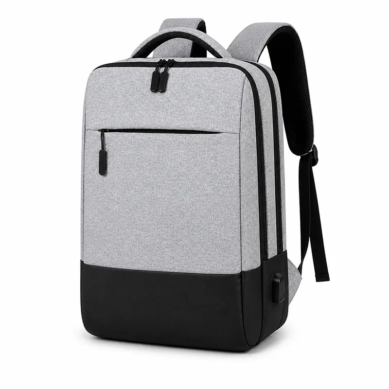 Premium grey laptop backpack manufacturer India with USB charging for bulk corporate gifting in events, promotions, IT tech companies & Businesses
