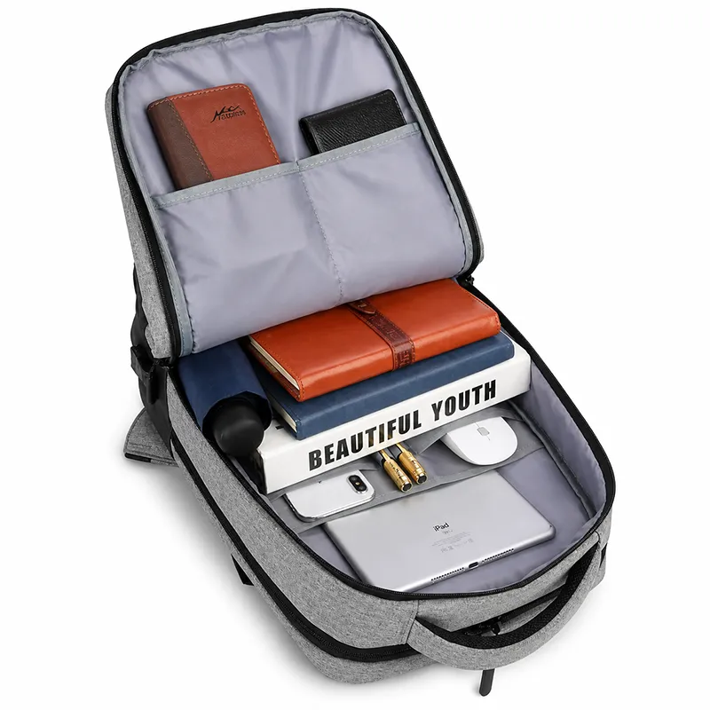 Premium grey laptop backpack manufacturer India with USB charging for bulk corporate gifting in events, promotions, IT tech companies & Businesses