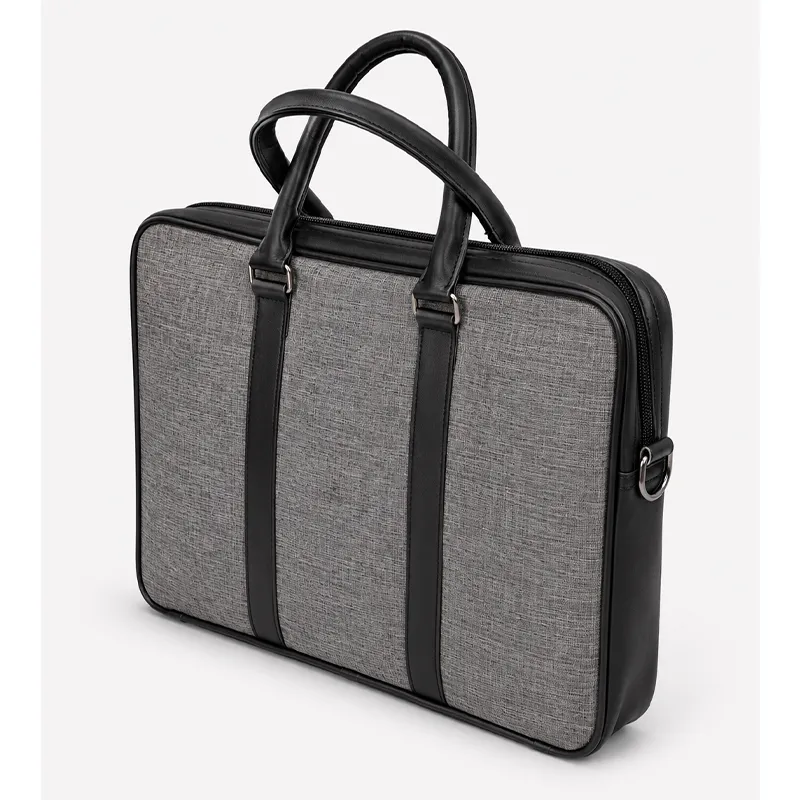 Customized laptop bags with company logo for employee welcome kits in Jaipur.